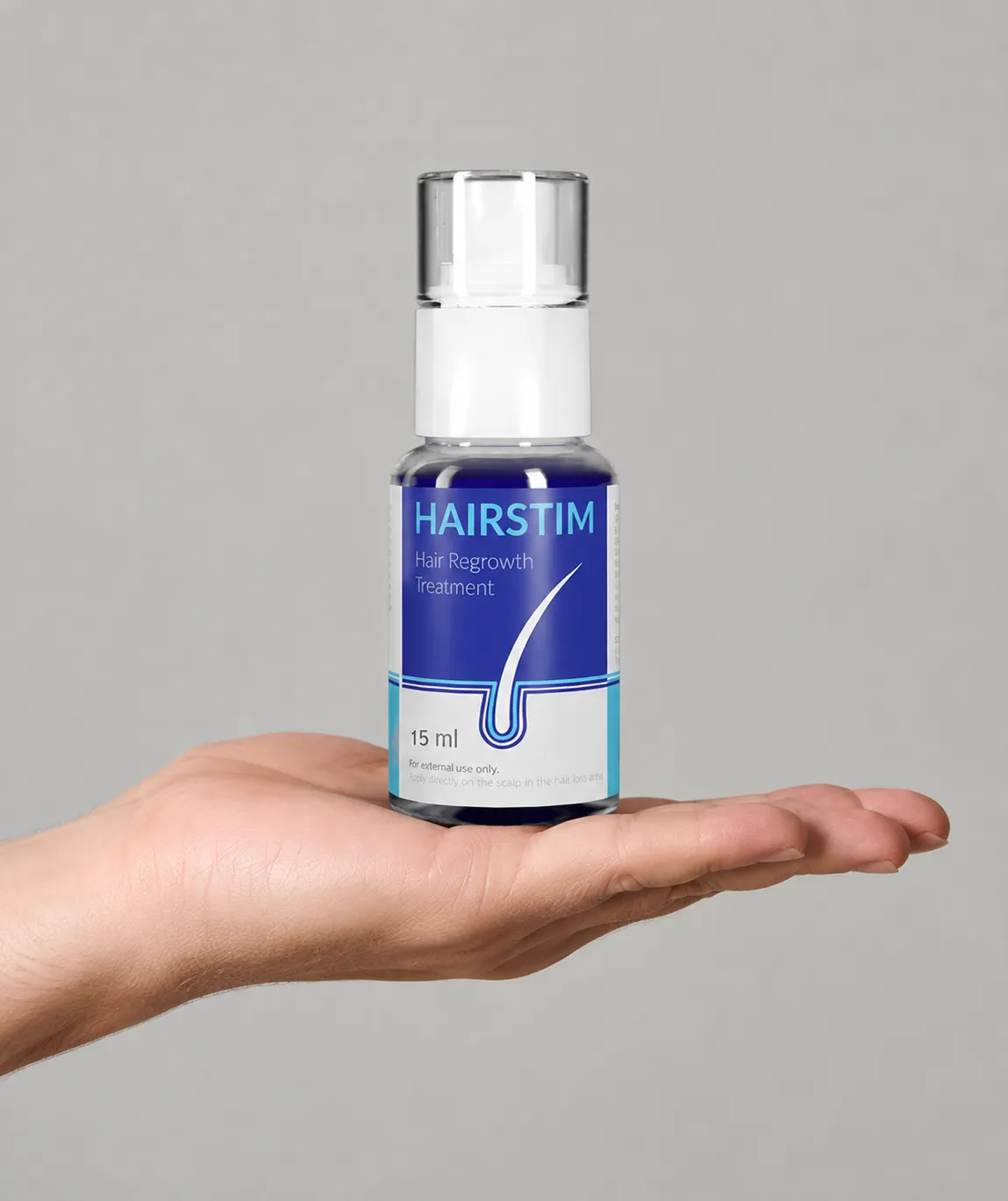Hairstim — opakowanie w dłoni